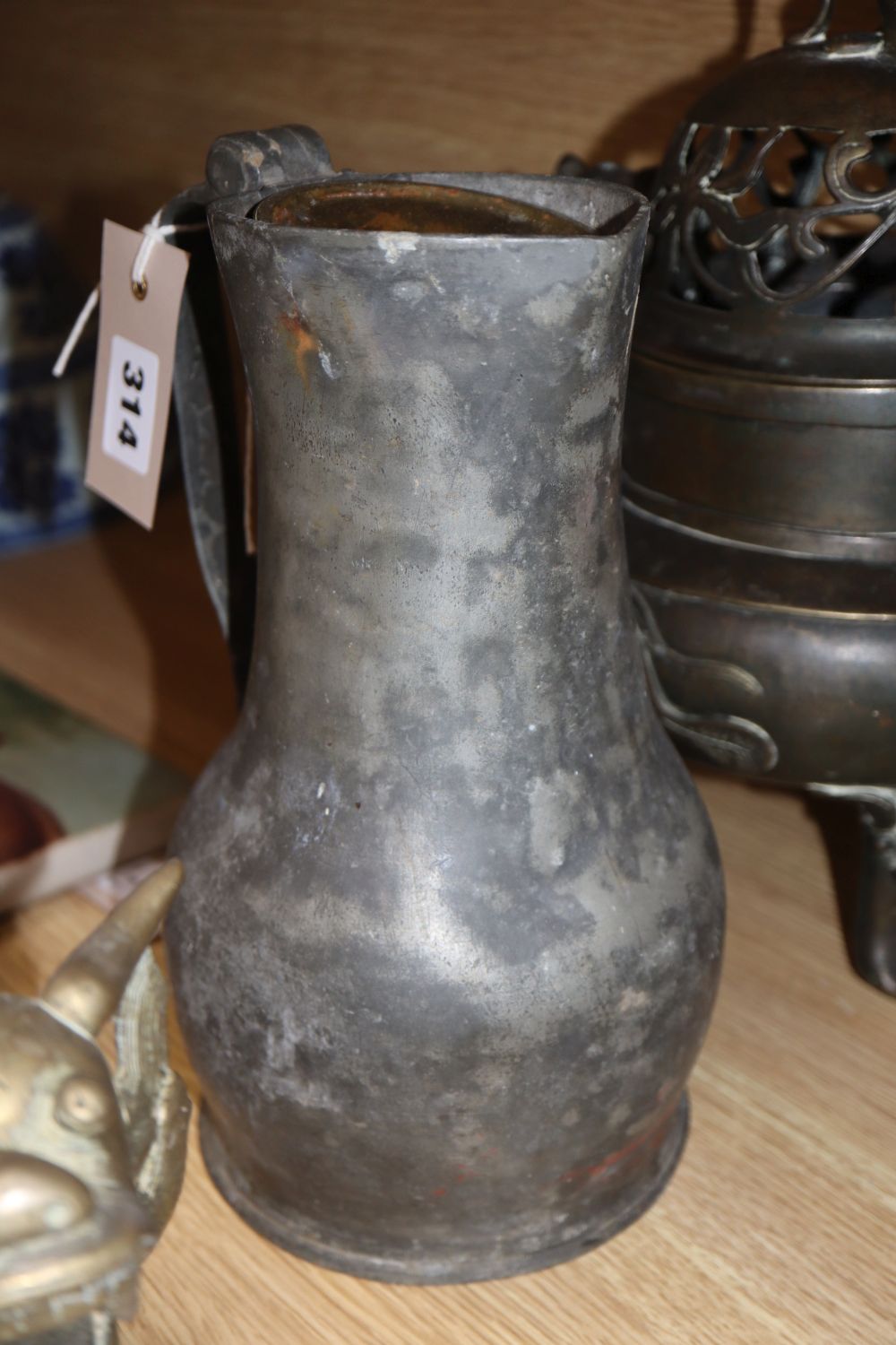 A 19th century Chinese bronze koro, with pierced cover, dragon handles and Dog of Fo finial, Xuande mark and sundry metalware